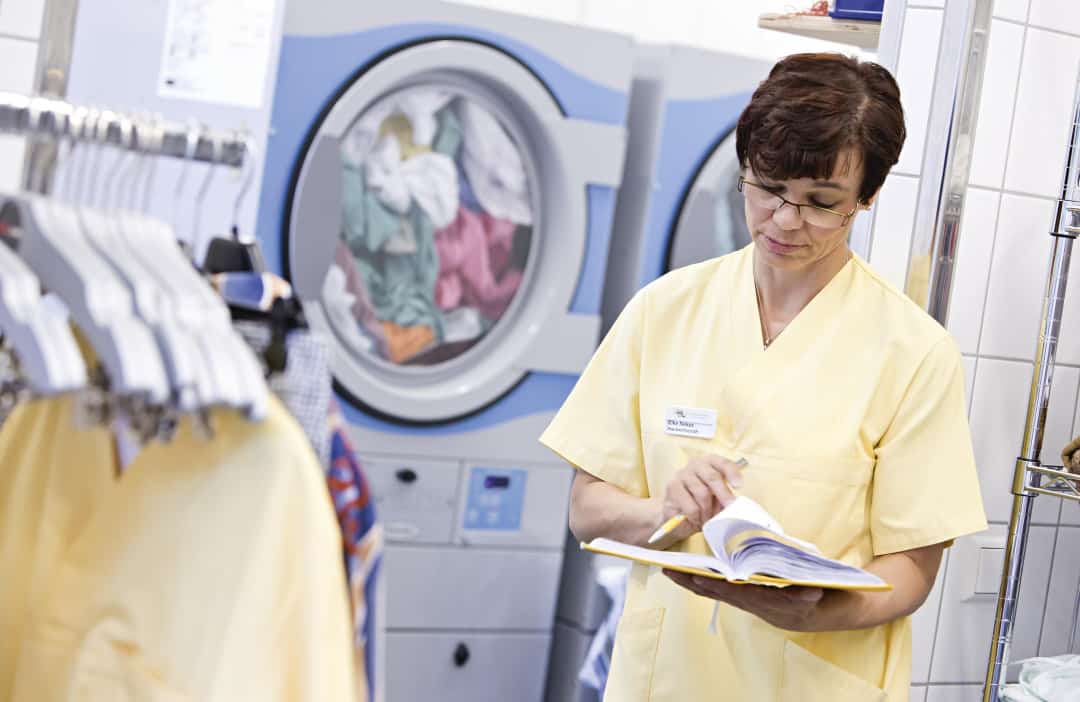 person working in a laundry